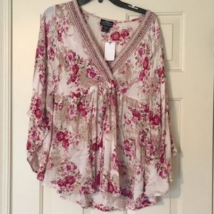 Brand new Angie bat sleeve top. New with tag